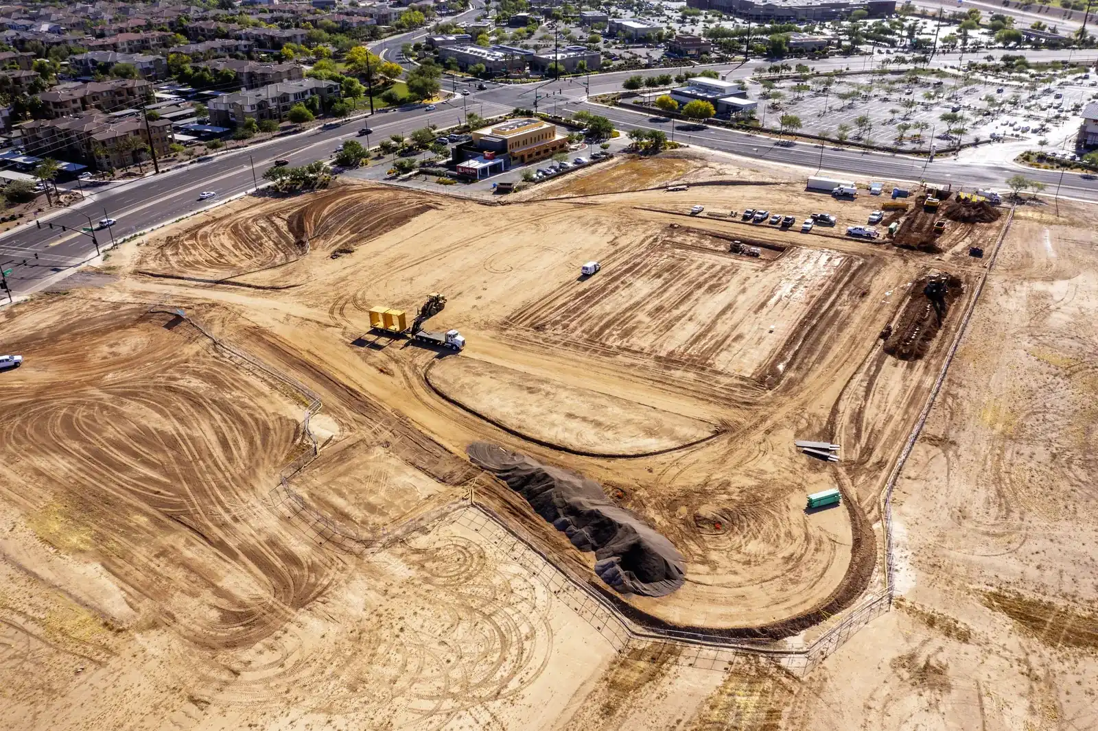 Aerial view of the ALDI construction site in Gilbert, Arizona during site grading